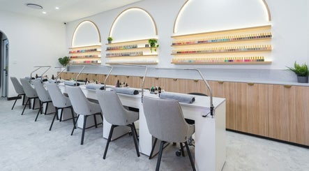 Modern manicure station at Ace Nails & Beauty Redfern, Redfern, New South Wales, AU elegantly lit with nail polish display.