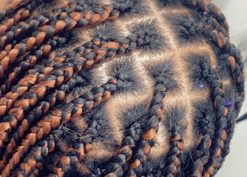 Close-up of intricate braids at Hair Palace LDN, Peckham rye, England, GB showcasing detailed styling.