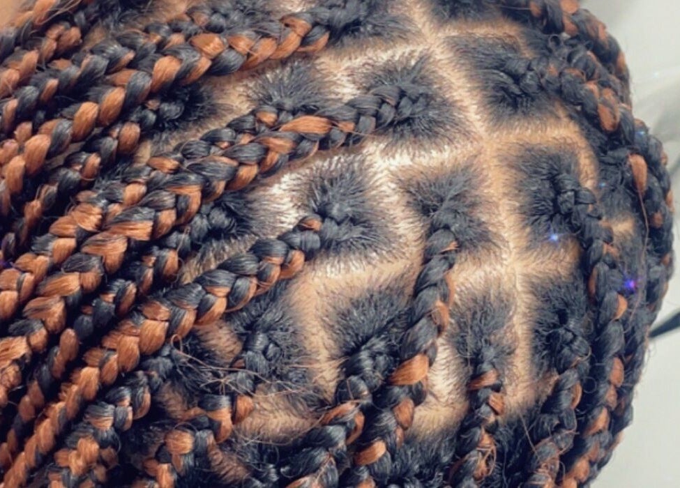 Close-up of intricate braids at Hair Palace LDN, Peckham rye, England, GB showcasing detailed styling.