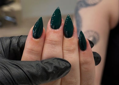 Sleek green stiletto nails at Beth Green Aesthetics, Manchester, England, GB.