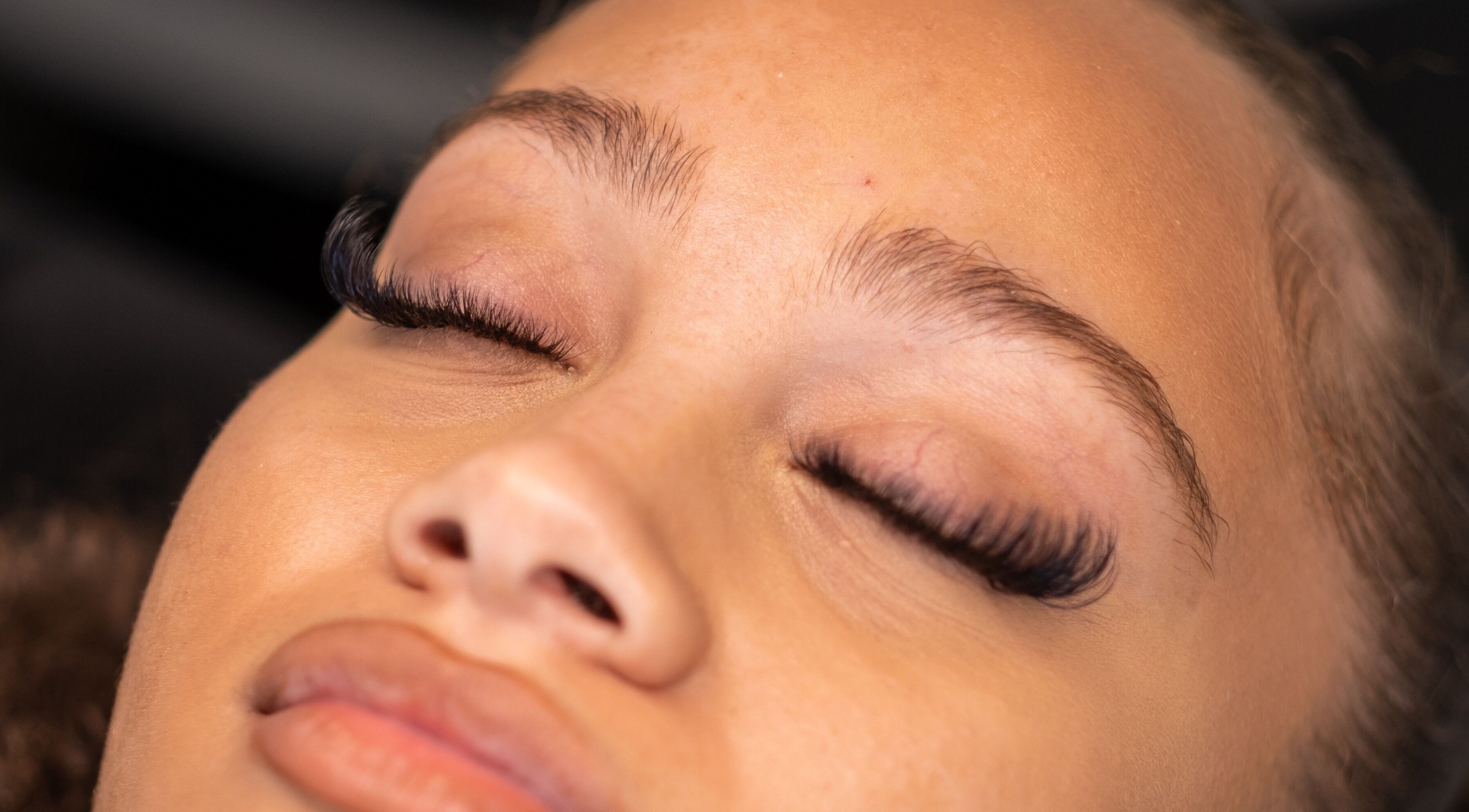 Close-up of eyelash extensions at She Lashes UK, Gloucester, England, GB.