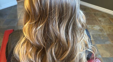 Beautifully styled wavy blonde hair at Narimane Kanaan, Ottawa, Ontario, CA.