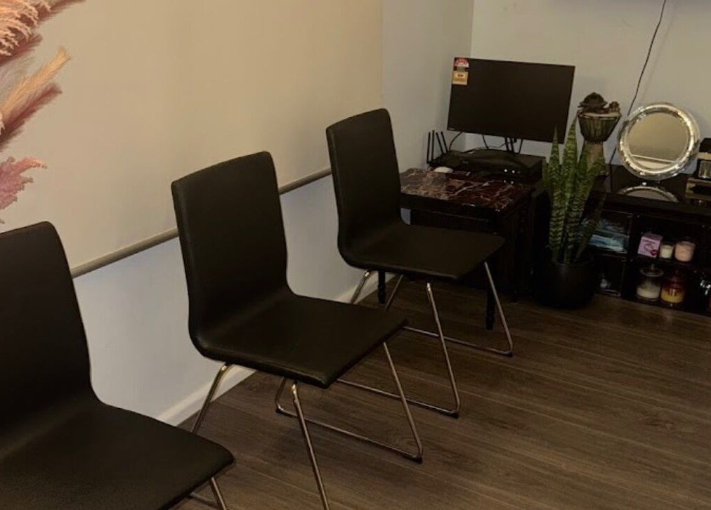 Relaxing seating area at Remotion remedial fusion therapy, Condell Park, New South Wales, AU, with cozy decor.