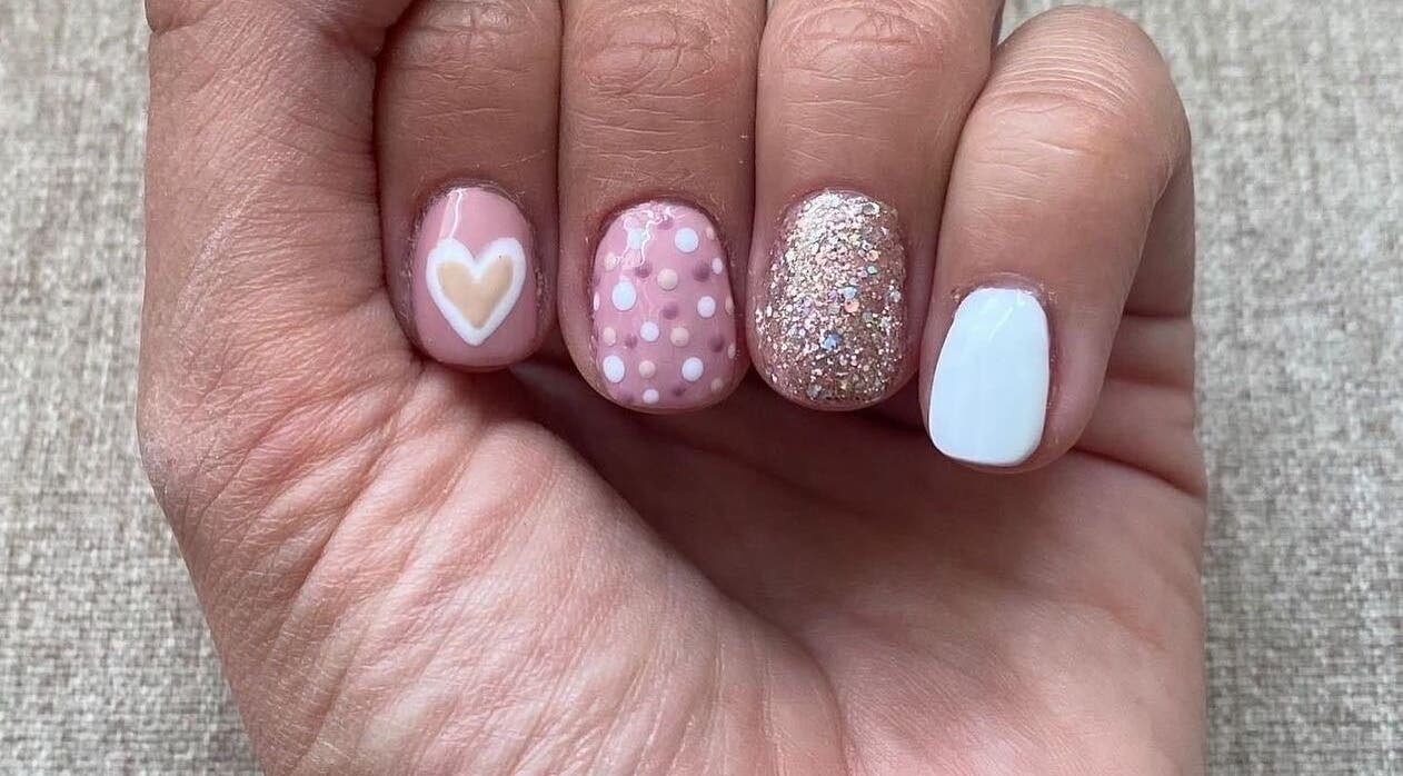 Colorful nail art with heart and glitter by Birdies Mobile Beauty - Rugby in Rugby, England, GB.