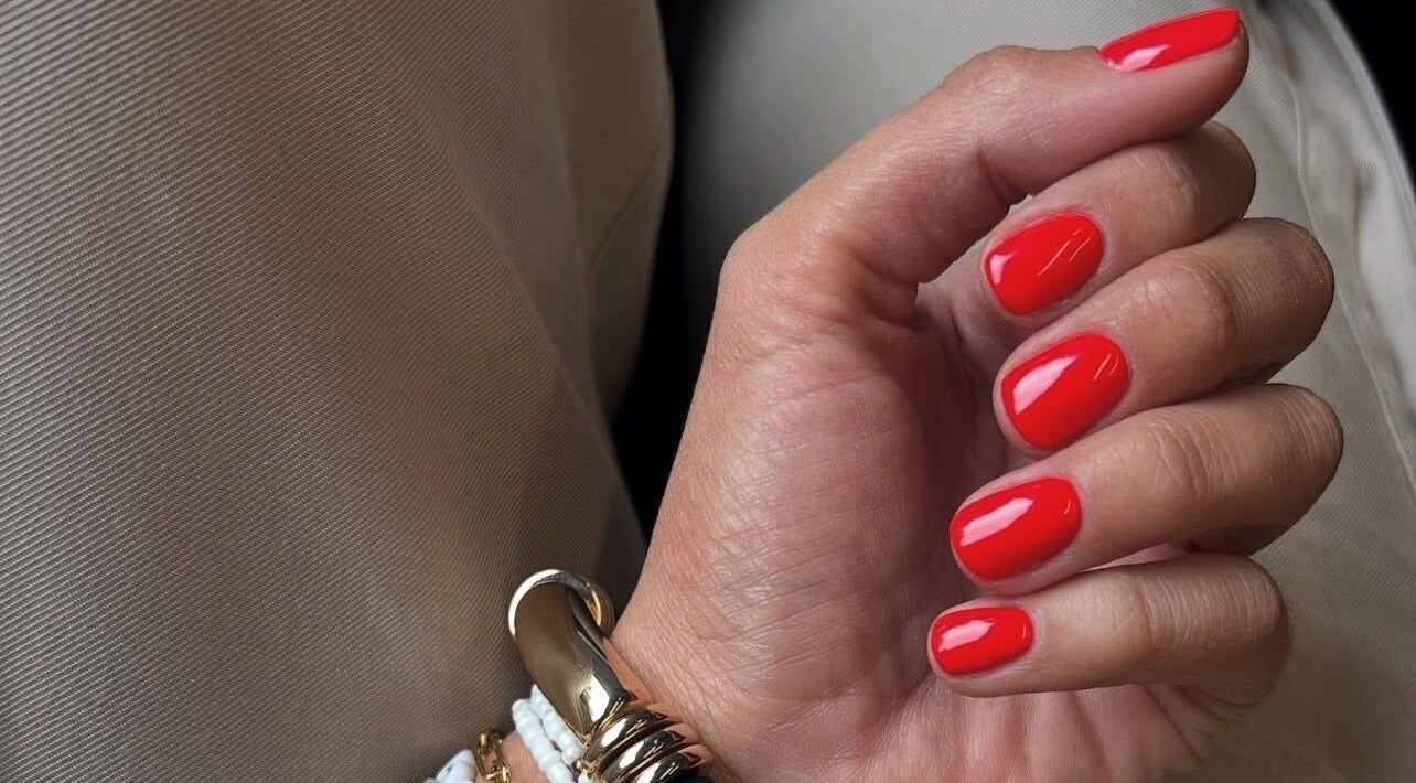 Vibrant red manicure by Birdies Mobile Beauty - Rugby at Rugby, England, GB, showcasing professional nail care.