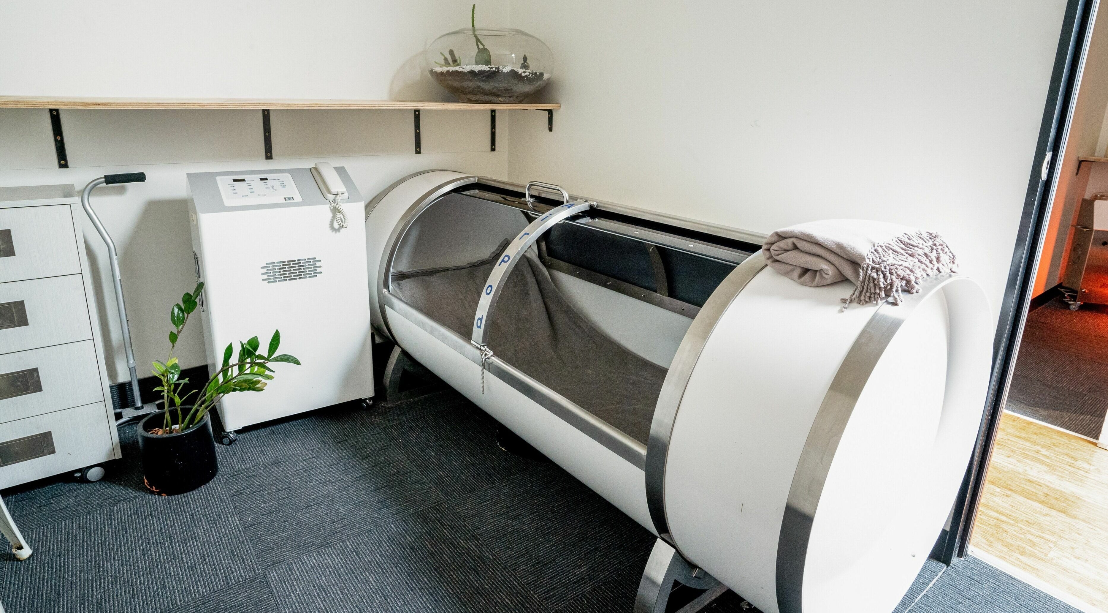 Relaxing hyperbaric chamber at The Orchard Prahran, Melbourne, Victoria, AU, enhancing wellness and rejuvenation.