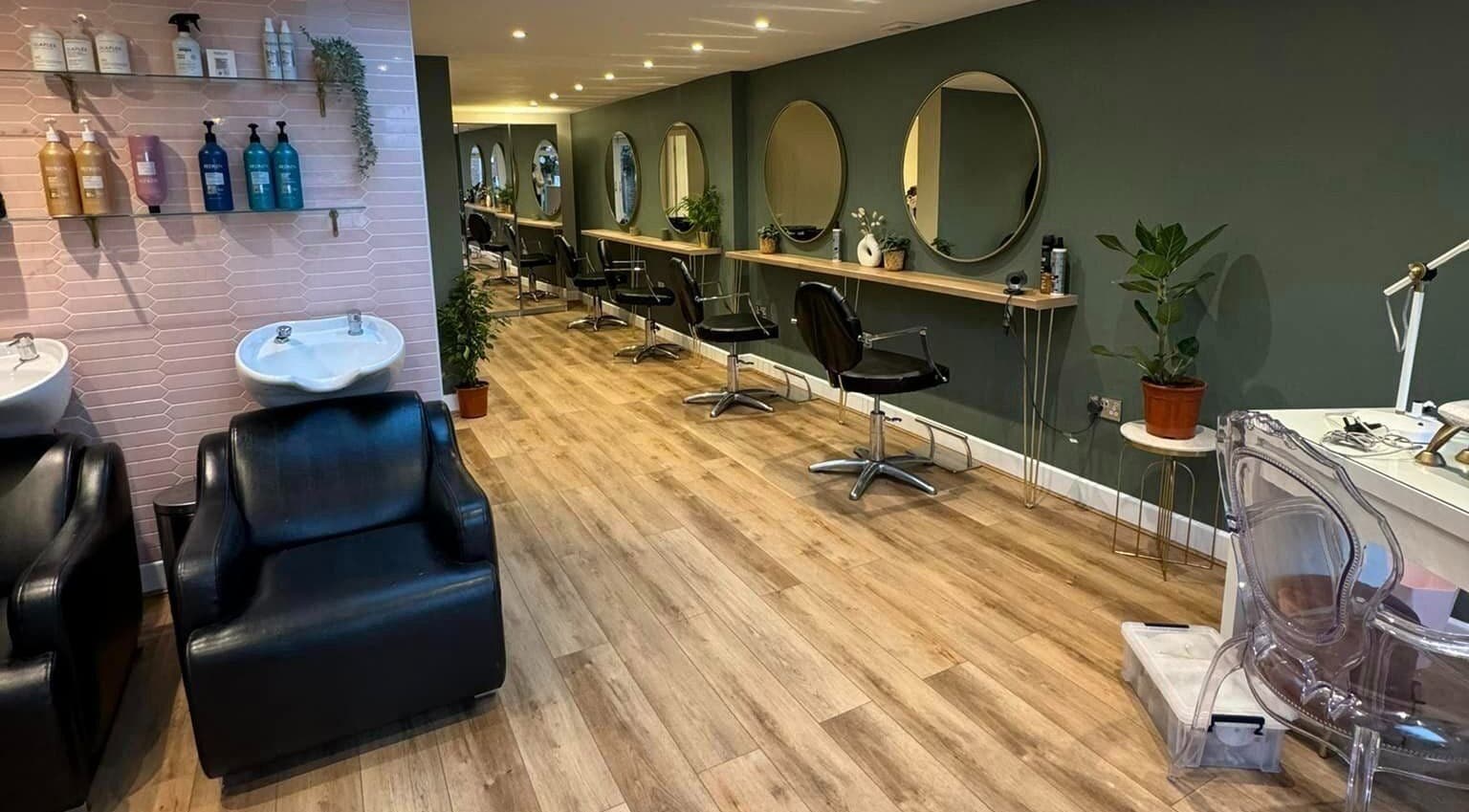 Modern interior of Hair by Frankie in Warsash, England, GB, showcasing stylish salon chairs and mirrors.