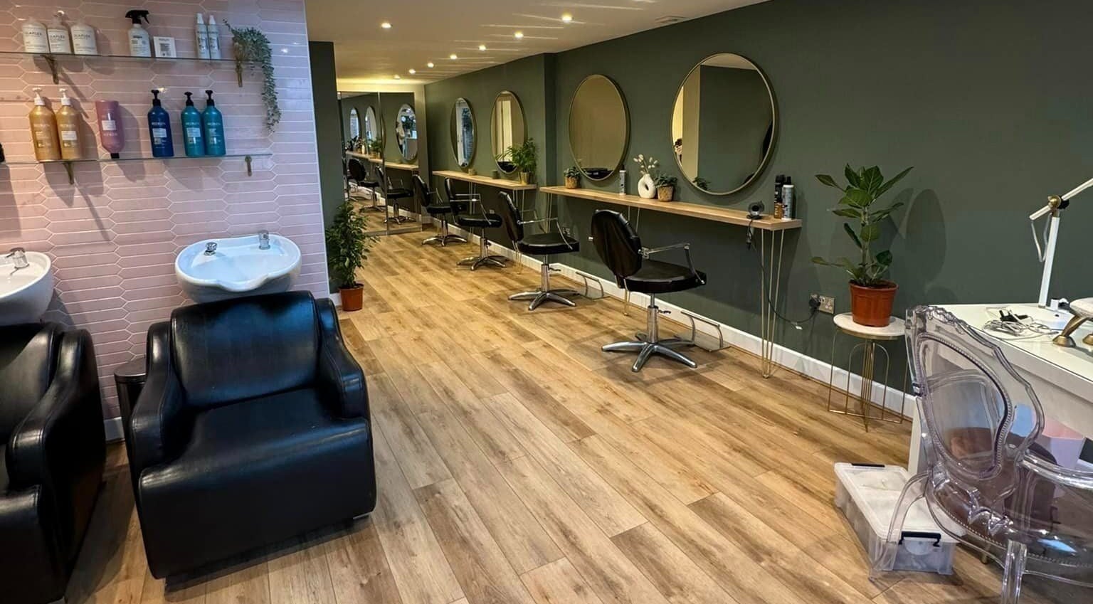 Modern interior of Hair by Frankie in Warsash, England, GB, showcasing stylish salon chairs and mirrors.