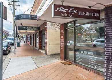 Street view of Alter Ego Hair Design & Cosmetics in Rose Bay, New South Wales, AU, showcasing its inviting exterior.