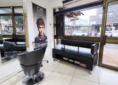 Modern salon interior at Alter Ego Hair Design & Cosmetics, Rose Bay, New South Wales, AU, with stylish seating.