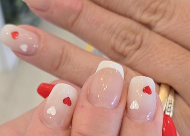 Heart-themed nail art design at Adore Beauty And Wellness, Hawthorne, Queensland, AU, showcasing intricate designs.