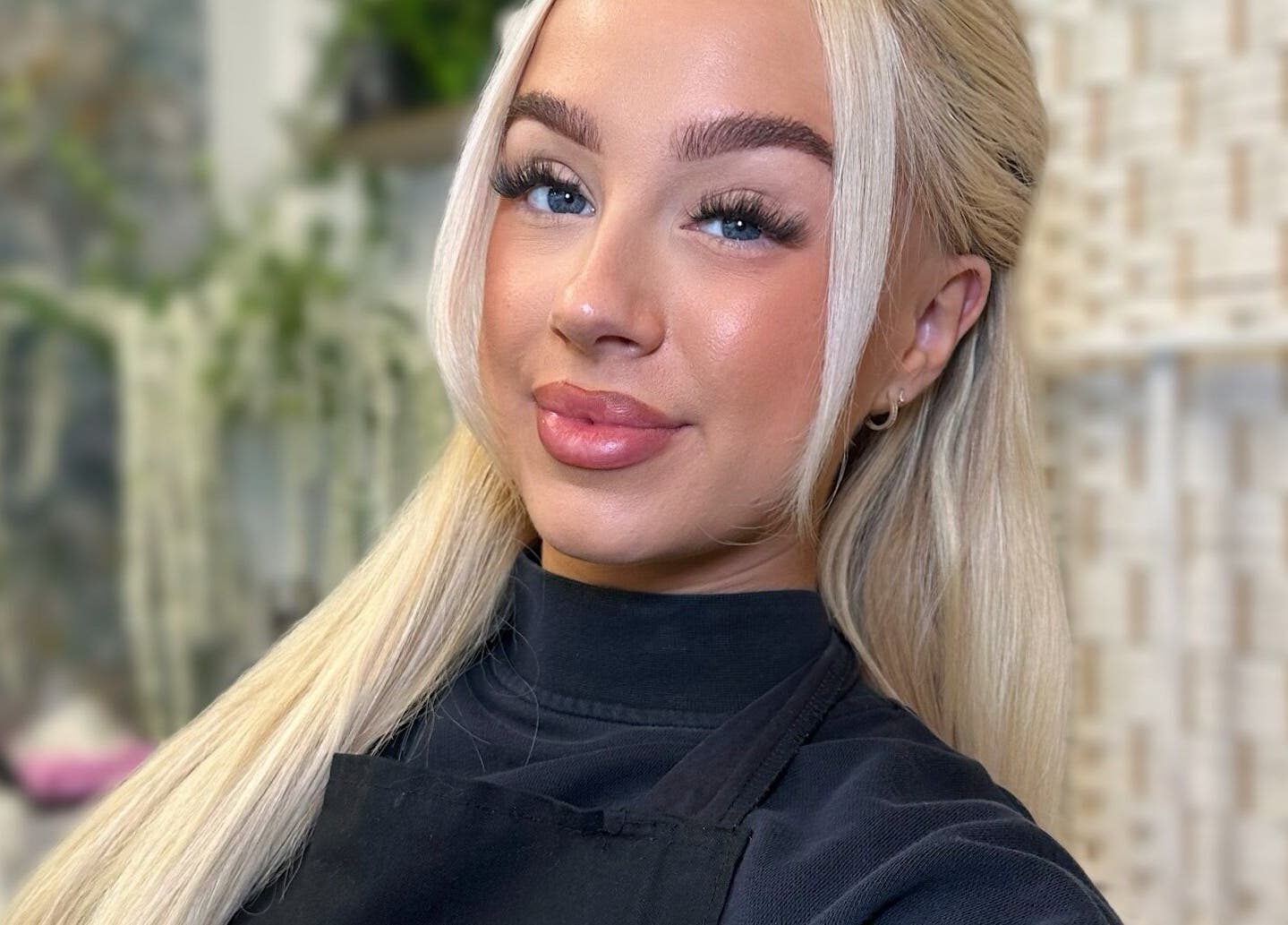 Experienced stylist at Braden Beauty in Uplands, Wales, GB, showcasing elegant beauty services.