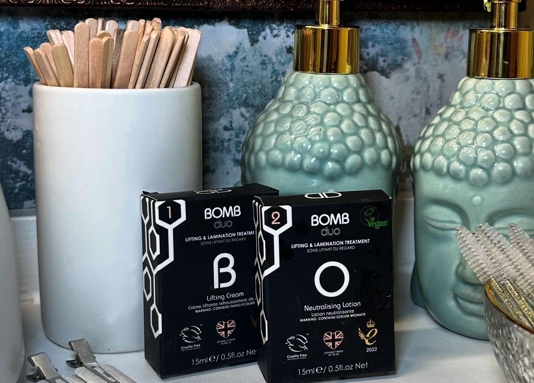 Braden Beauty's skincare products on elegant countertop in Uplands, Wales, GB, featuring lifting and lamination treatments.