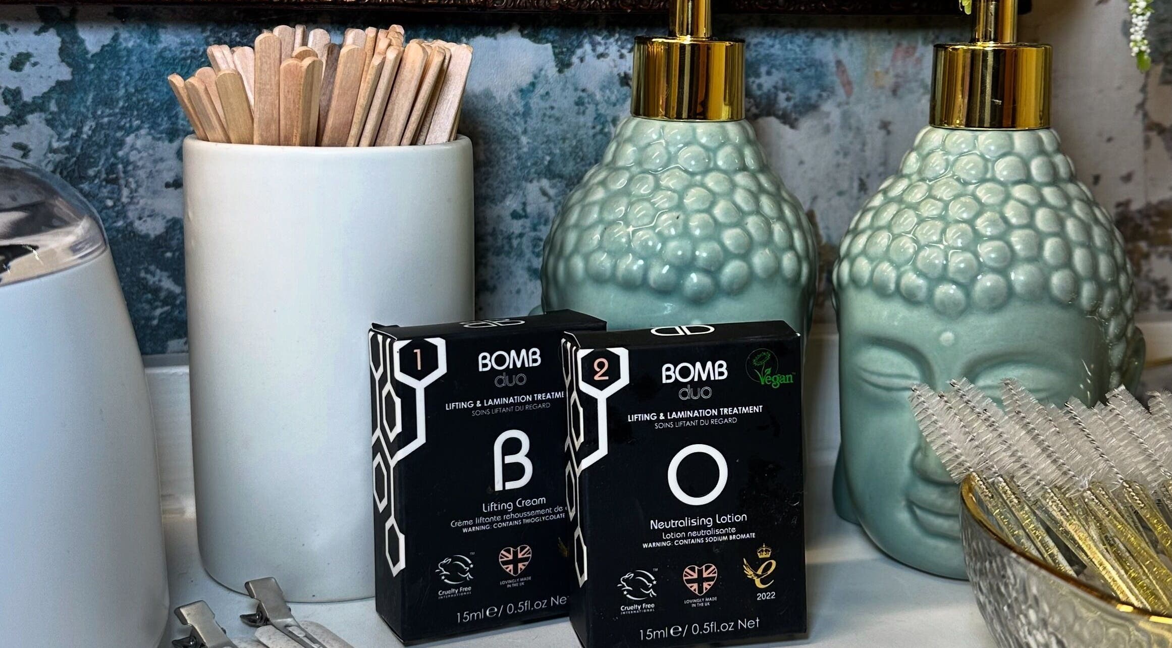 Braden Beauty's skincare products on elegant countertop in Uplands, Wales, GB, featuring lifting and lamination treatments.