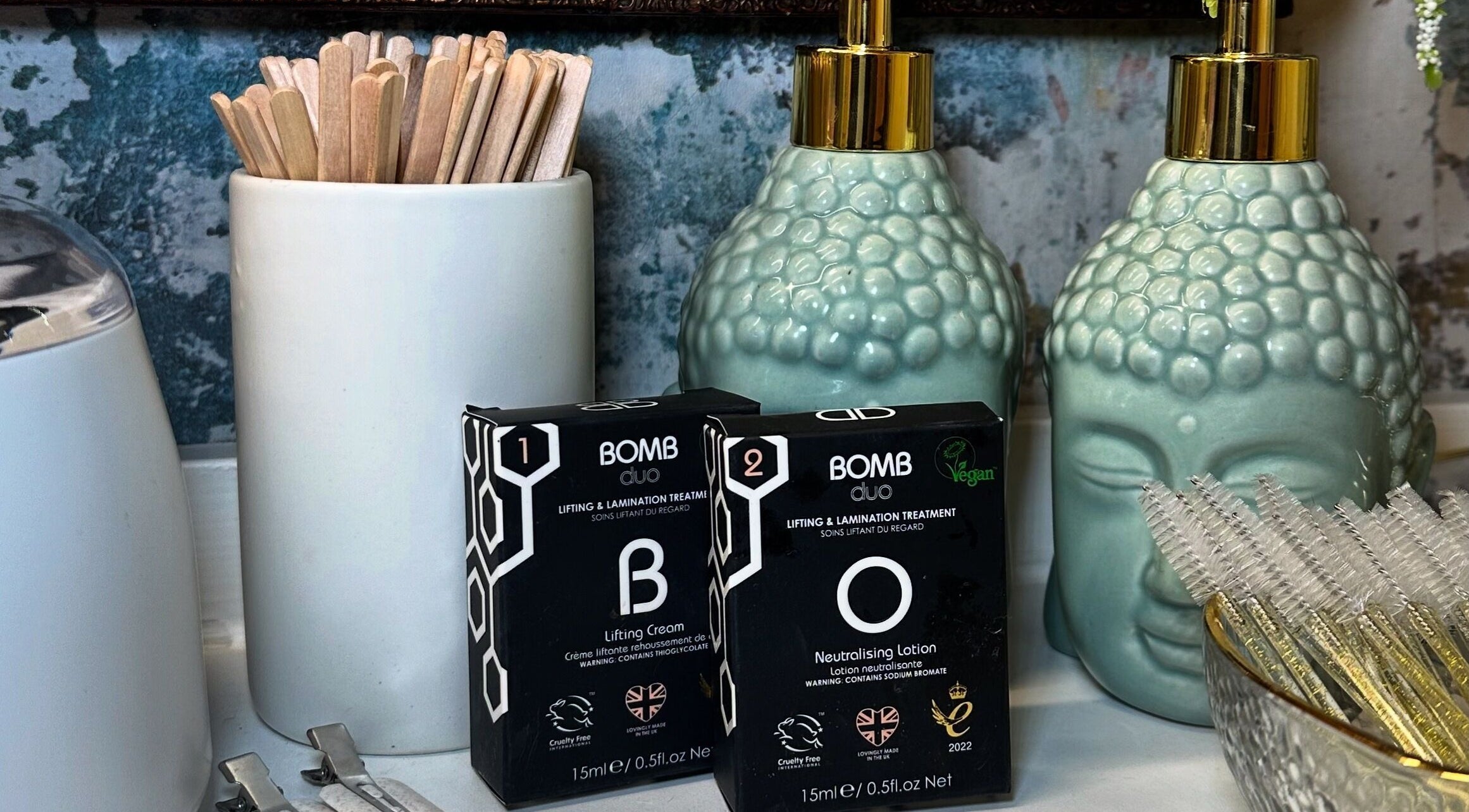 Braden Beauty's skincare products on elegant countertop in Uplands, Wales, GB, featuring lifting and lamination treatments.