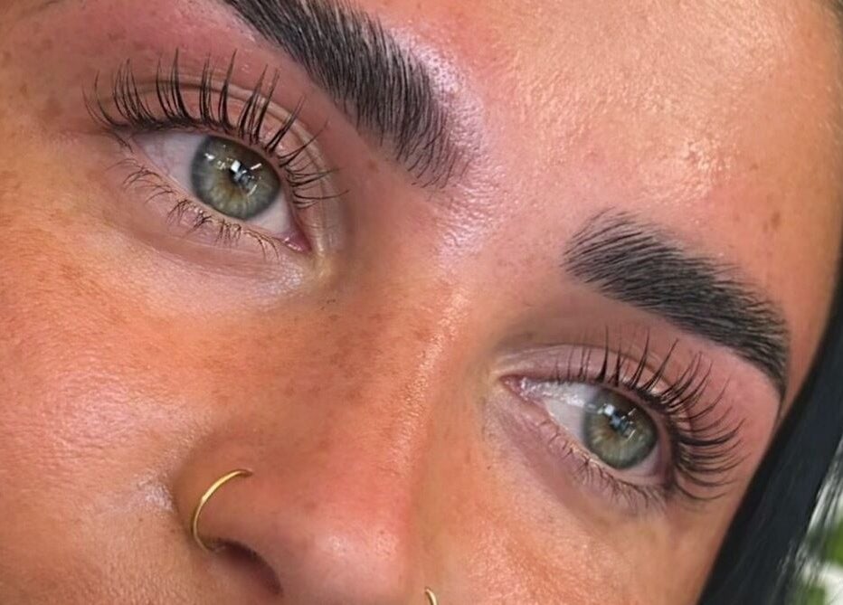Close-up of expertly groomed eyebrows and lush lashes at Braden Beauty, Uplands, Wales, GB.