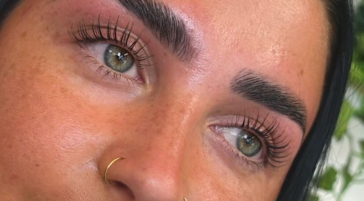 Close-up of expertly groomed eyebrows and lush lashes at Braden Beauty, Uplands, Wales, GB.