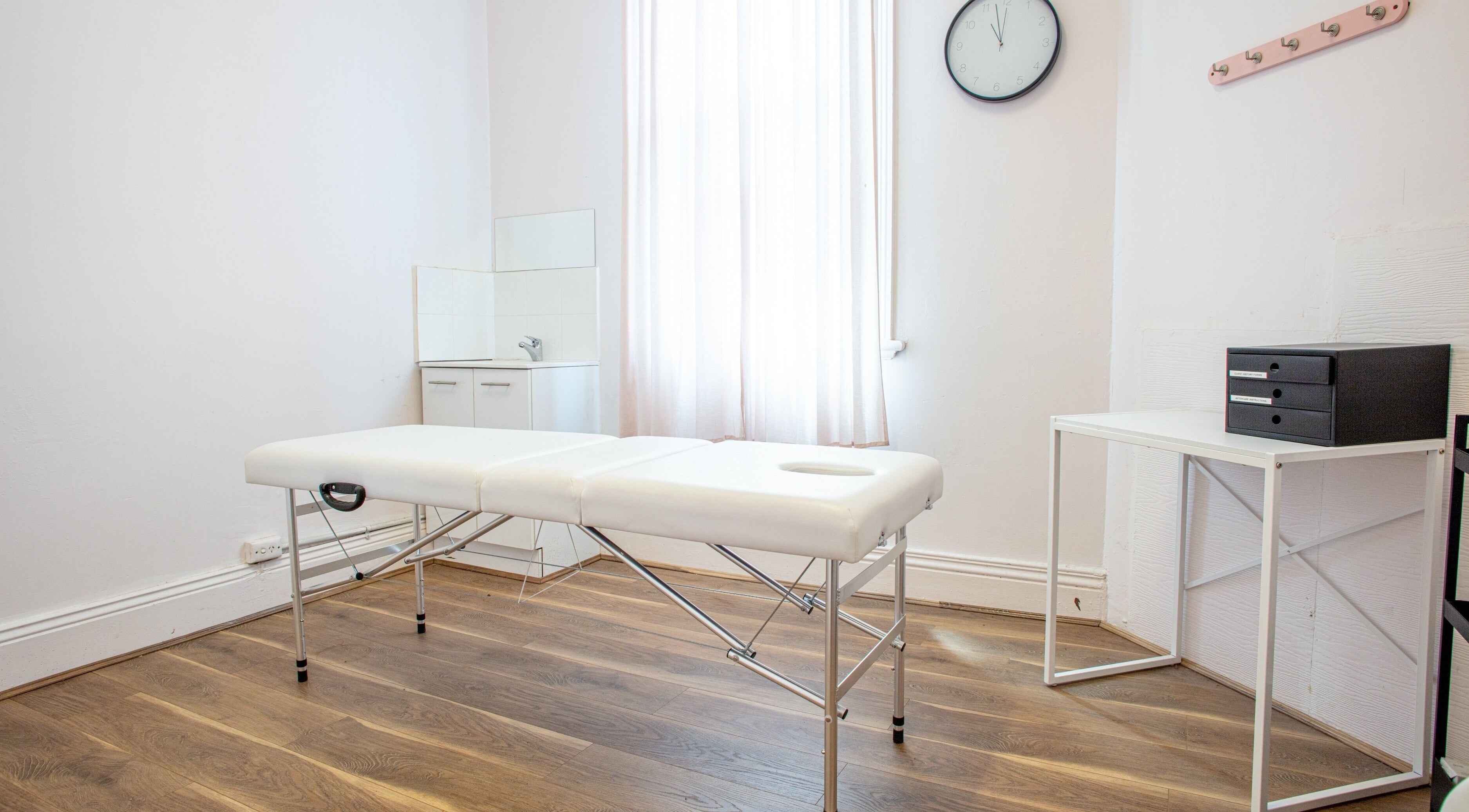 Massage room at Diva Care Nails and Spa, Richmond, Victoria, AU featuring a comfy table and warm ambiance.