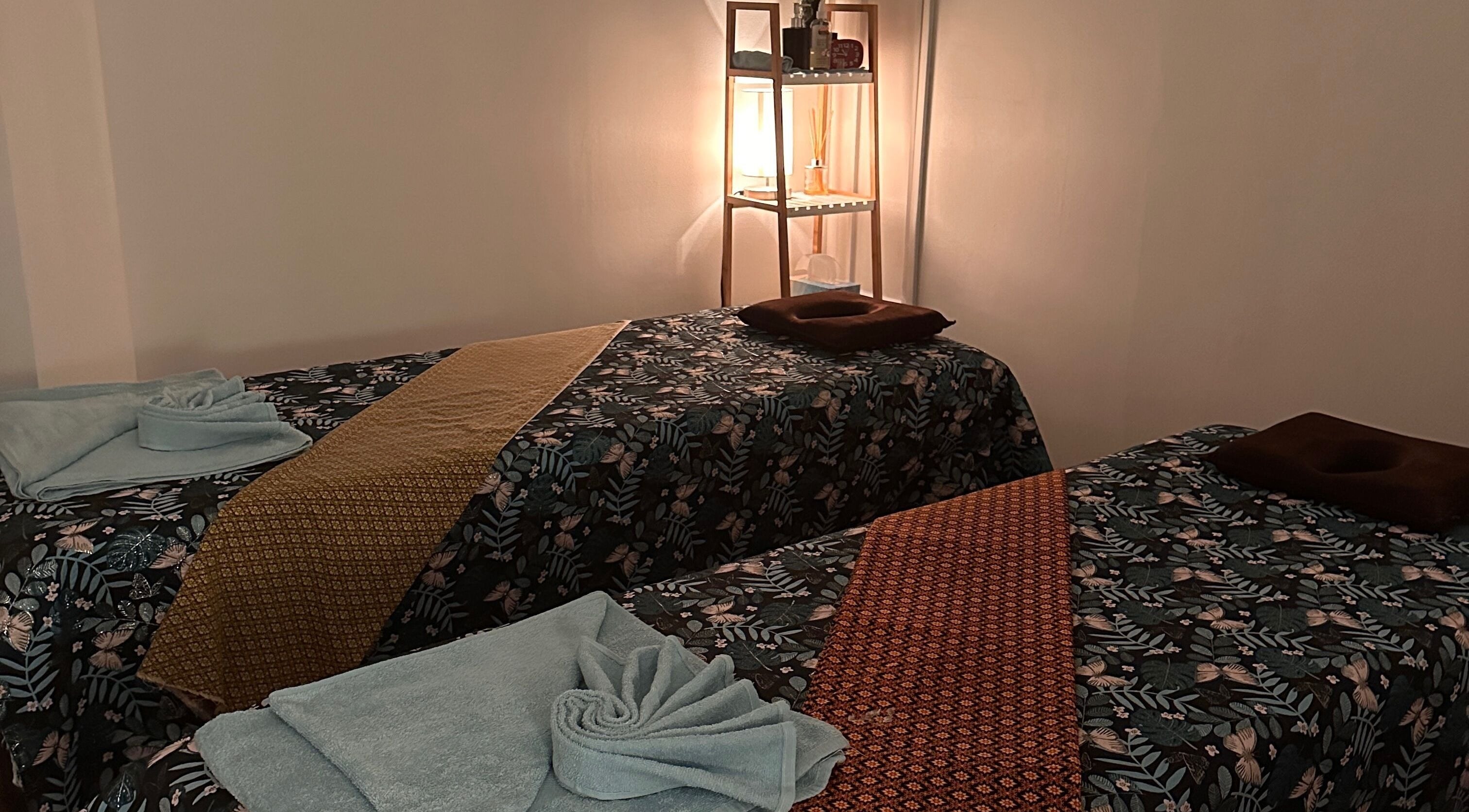 Cozy massage room at Deep Relax Massage On Pitt Street, Sydney, New South Wales, AU, with two prepared massage tables.