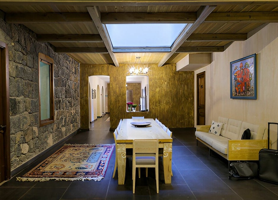 Inviting, rustic interior of Apricot Spa in Yerevan, Yerevan, AM spotlighting cozy seating and elegant decor.