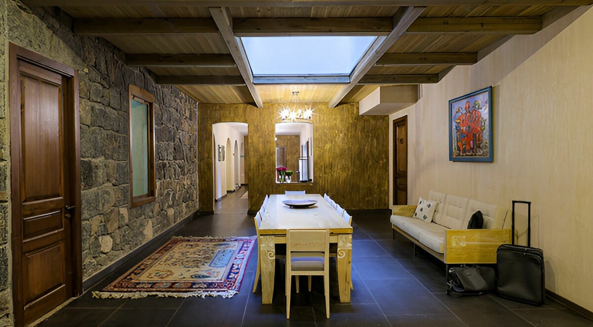 Inviting, rustic interior of Apricot Spa in Yerevan, Yerevan, AM spotlighting cozy seating and elegant decor.