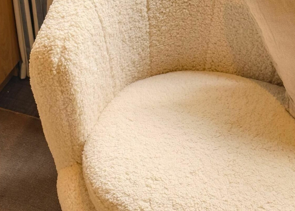 Plush, cream-colored chair at Apricot Spa, Yerevan, Yerevan, AM enhances a peaceful ambiance.