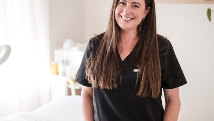 Smiling beauty professional at Justine Michele Beauty, Melbourne, Victoria, AU.