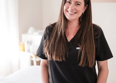Smiling beauty professional at Justine Michele Beauty, Melbourne, Victoria, AU.