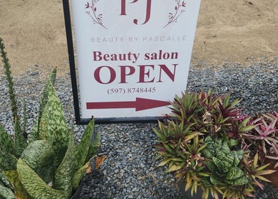 Beauty by Pascalle salon open sign with plants, Paramaribo, SR.