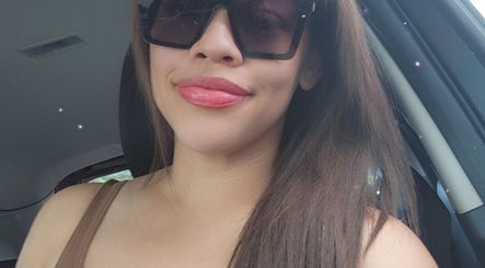 Woman in sunglasses smiling in car. Beauty by Pascalle, Paramaribo, Paramaribo, SR.