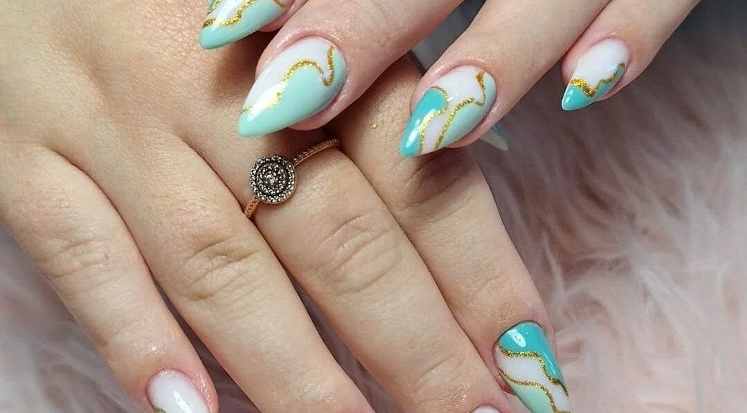 Elegant nail art with turquoise and gold accents at Dhany Nails, County Clare, County Clare, IE.