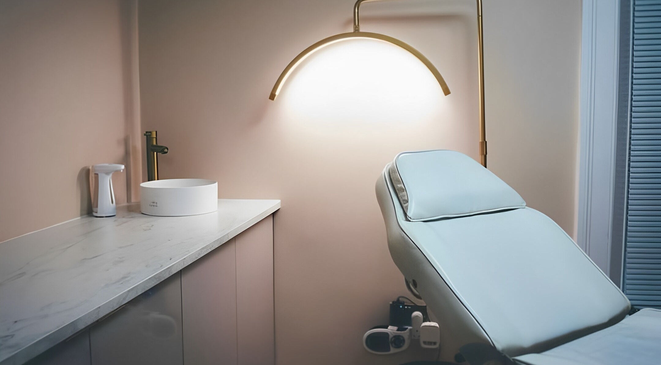 Luxurious treatment room at Imran Tai Aesthetics, Batley, England, GB with modern decor and comfortable setup.