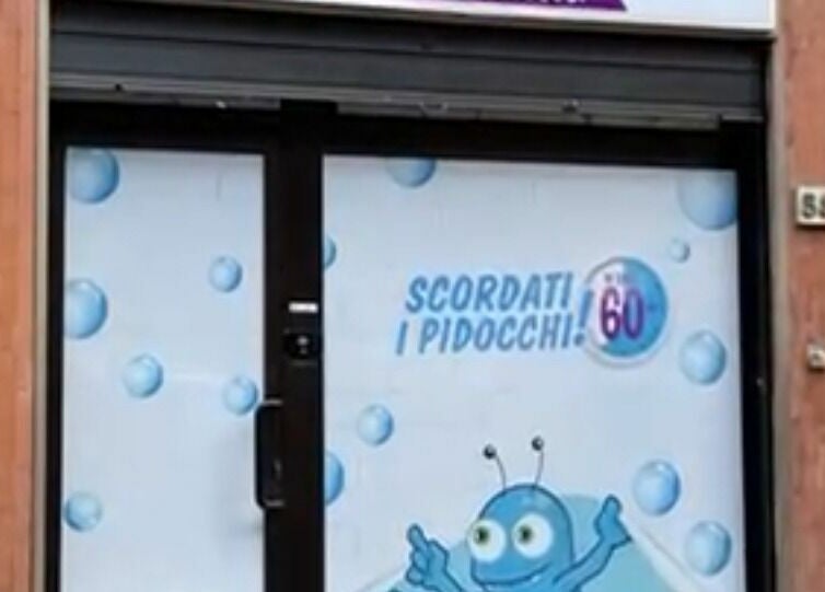 Ingresso di Gogo Pidocchio - Firenze a Firenze, Toscana, IT con illustrazione di personaggio animato.