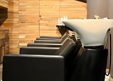 Modern shampoo stations at Megy’s Hair Studio, London, England, GB. Stylishly designed for comfort and elegance.