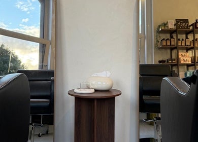 Modern interior seating at Megy’s Hair Studio, London, England, GB, with stylish decor and natural light.