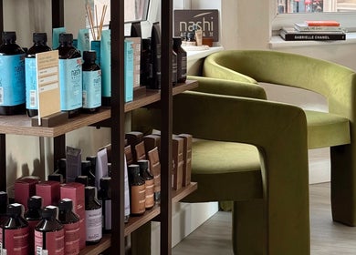 Product display at Megy’s Hair Studio, London, England, GB, featuring premium haircare items.
