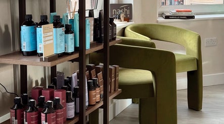 Product display at Megy’s Hair Studio, London, England, GB, featuring premium haircare items.