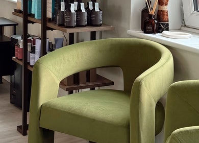 Stylish seating area with products at Megy’s Hair Studio, London, England, GB.