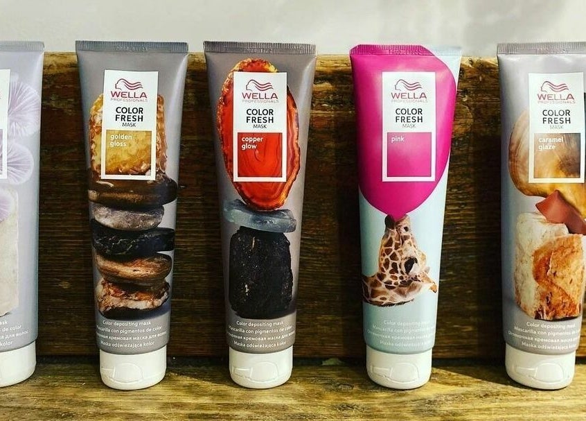 Colorful Wella hair masks on display at Aimee-Blu in London, England, GB. Enhance your hair's vibrancy.
