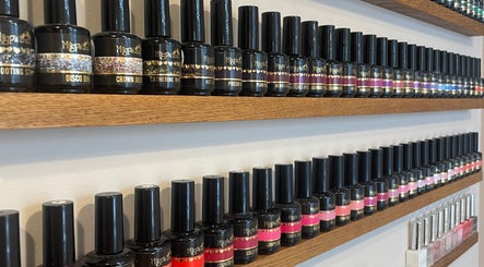 Colorful nail polish display at Nails From Natalie, Honiton, England, GB.