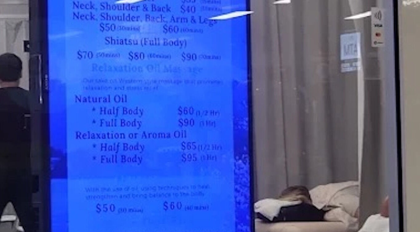 Menu display at Fuji Natural Therapies in Gold Coast, Queensland, AU, showcasing massage options and prices.
