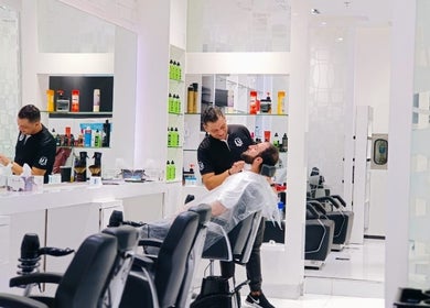 Professional grooming at The Lab Gents Salon & Spa - Meadows Town Center, Dubai, AE, with stylish modern interior.
