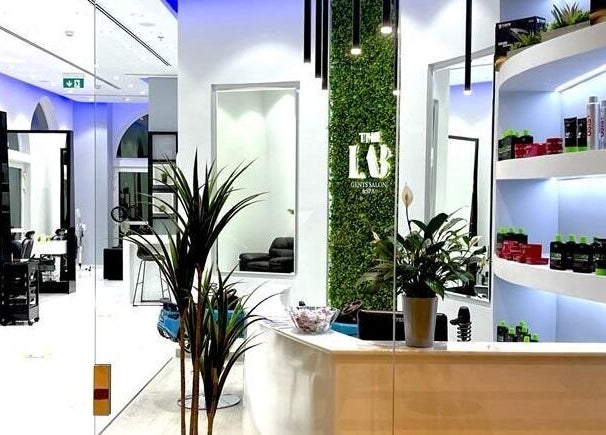 Interior of The Lab Gent's Salon & Spa - Arabian Ranches 2 in Dubai, AE with modern decor and products displayed.