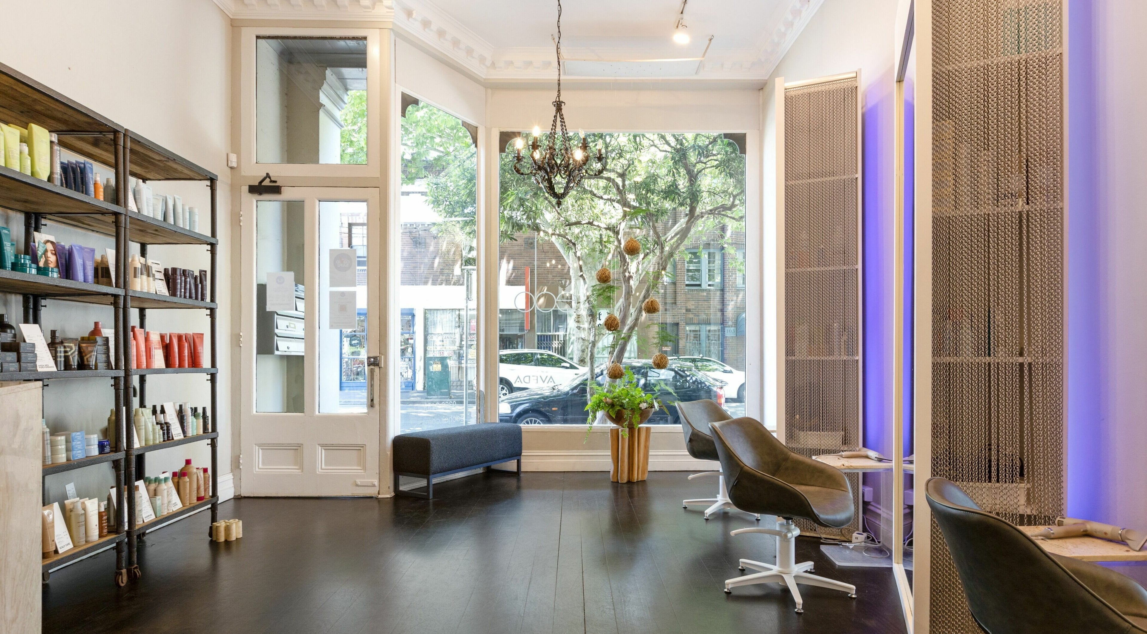 Modern interior of Edo Hair Design and Beauty in Woolloomooloo, New South Wales, AU, featuring chic decor.