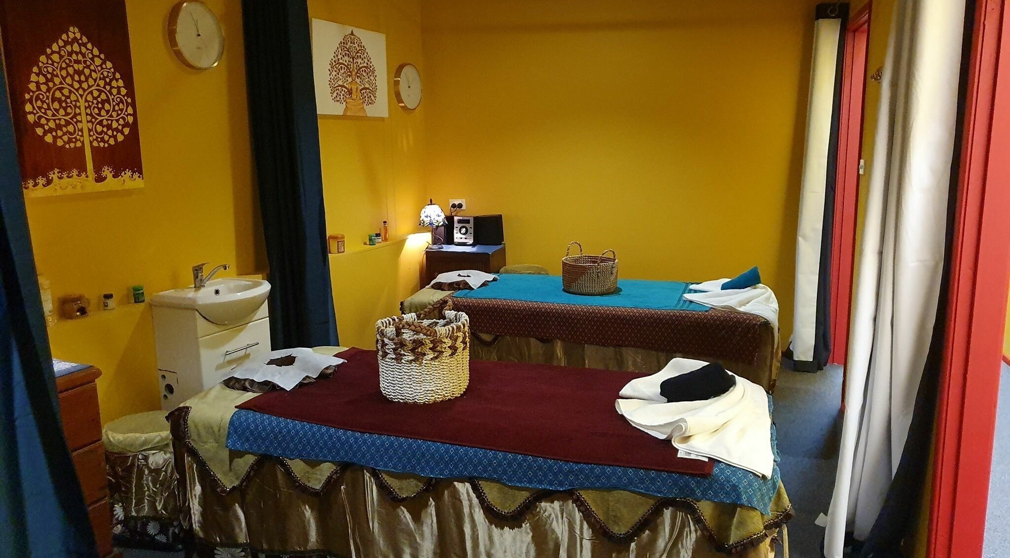Relaxing twin massage beds at Wyoming Thai Massage, Wyoming, New South Wales, AU, offering a tranquil retreat.