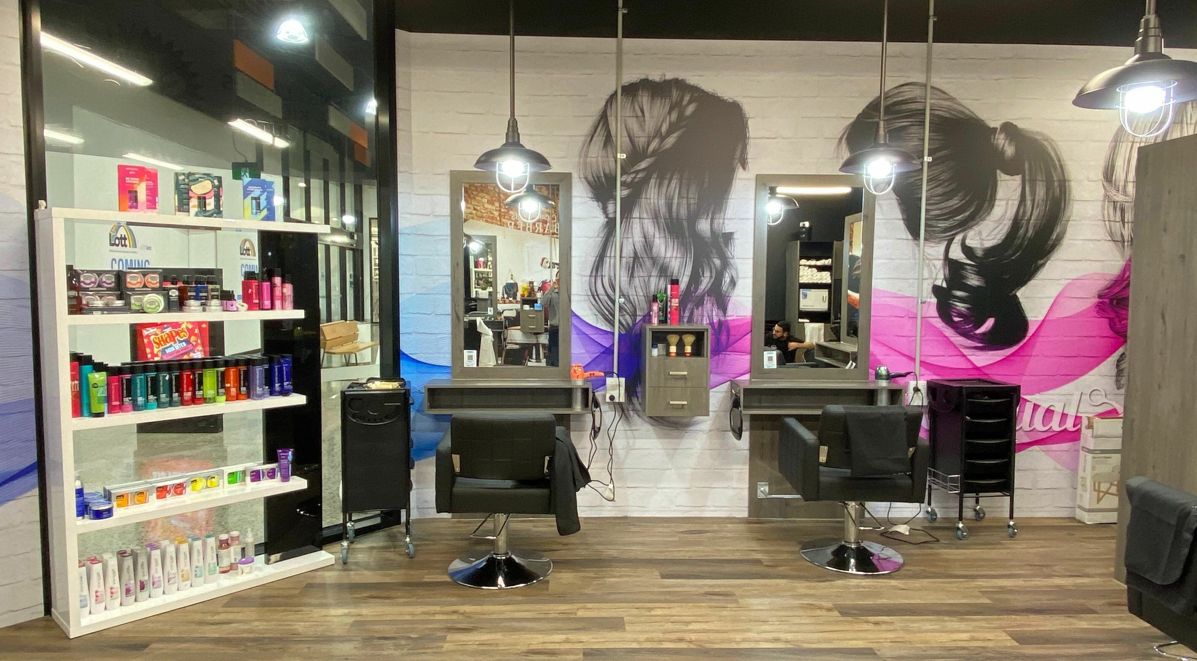Inside Casual Cuts - Kilmore, Victoria, AU featuring styling stations and vibrant decor.