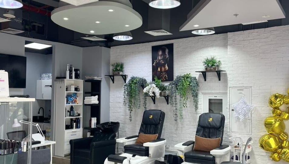 Modern interior of Diana's Lash House Ladies Salon in Dubai, AE featuring elegant pedicure chairs and lush decor.