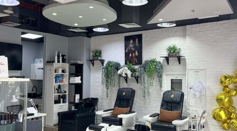 Modern interior of Diana's Lash House Ladies Salon in Dubai, AE featuring elegant pedicure chairs and lush decor.