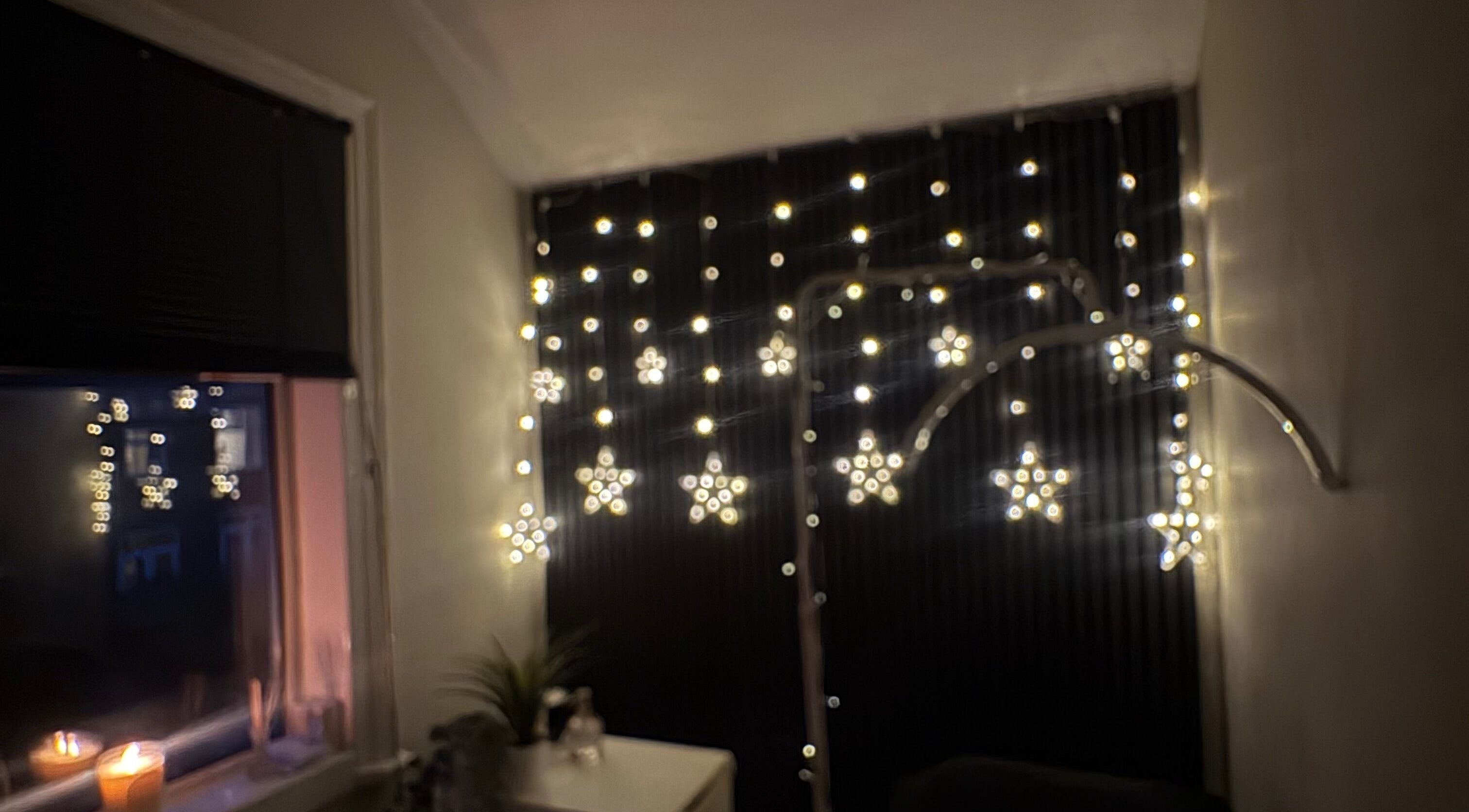 Warm, starry light decor creating a cozy ambiance at Hmbeautystudio in Sale, England, GB.