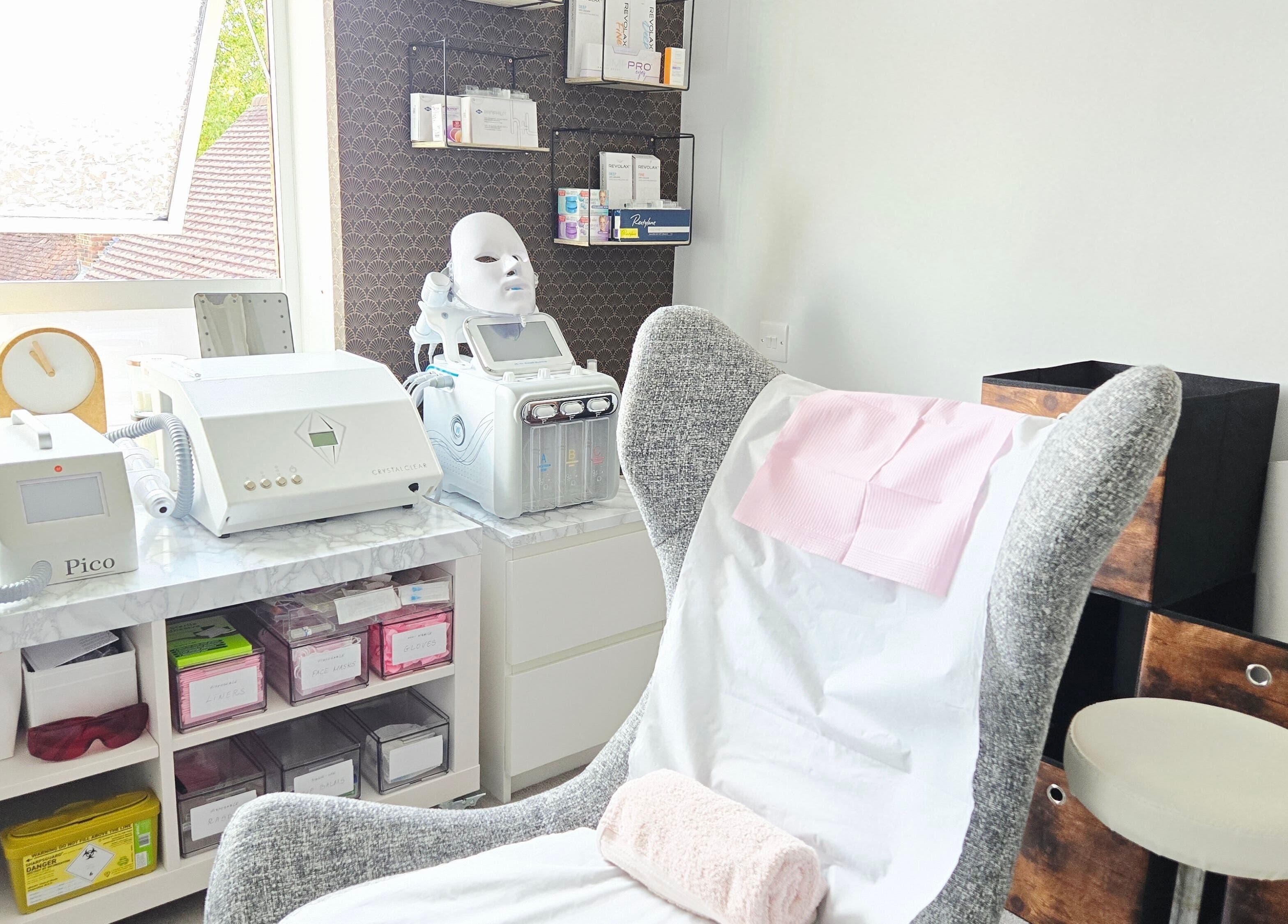 Bright, inviting treatment room at DERMEDICA Beauty Studio, Hertford, GB, featuring modern skincare equipment.